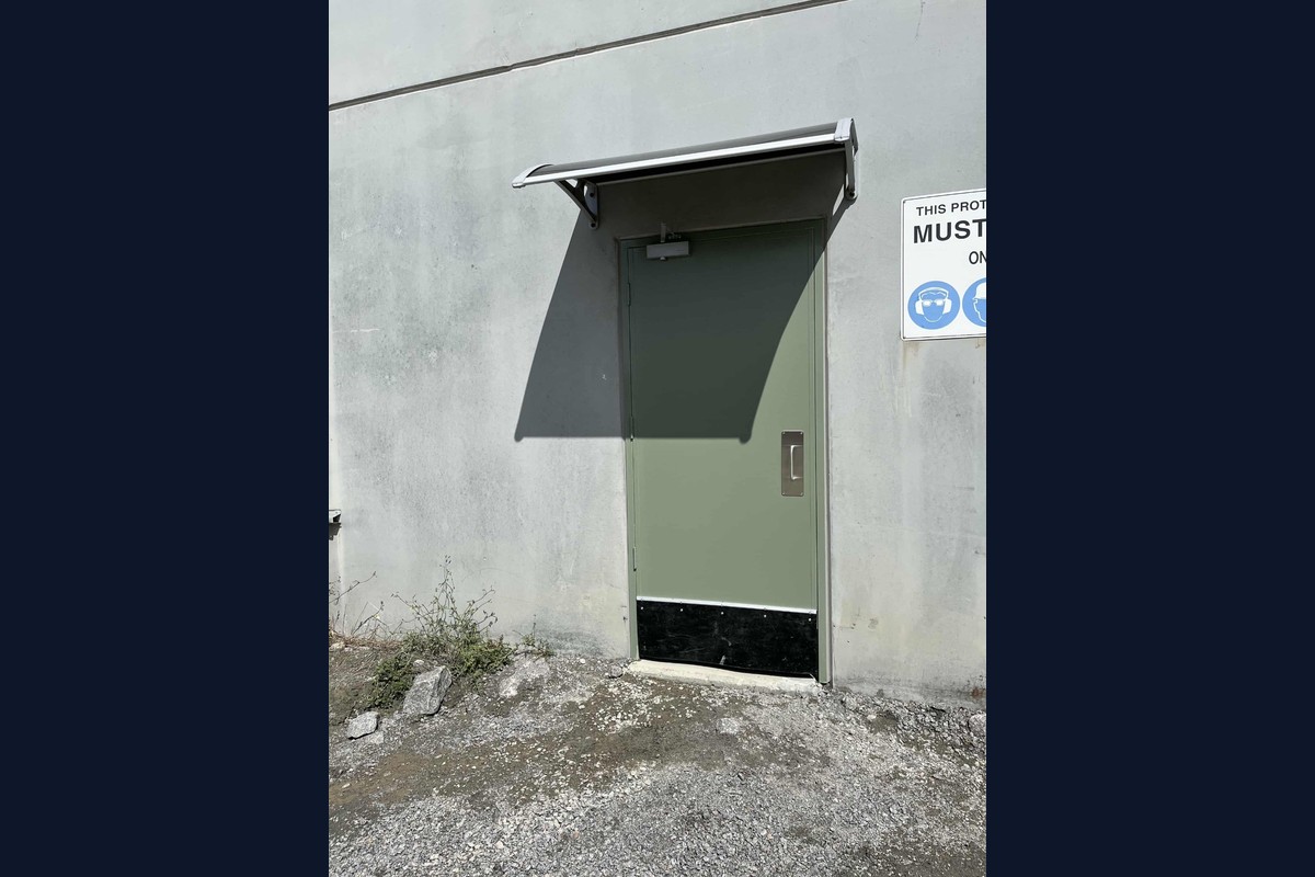 Installation of commercial grade door and awning